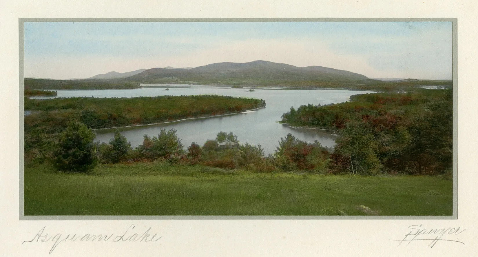 A colored drawing of a large body of water surrounded by green grass, trees, and a large mountain in the background. The words "Asquam Lake" and "Sawyer" are written in cursive writing in pencil. The title "Asquam Lake" are placed in the bottom left-hand corner, and "Sawyer" is placed in the bottom right-hand corner of the postcard.