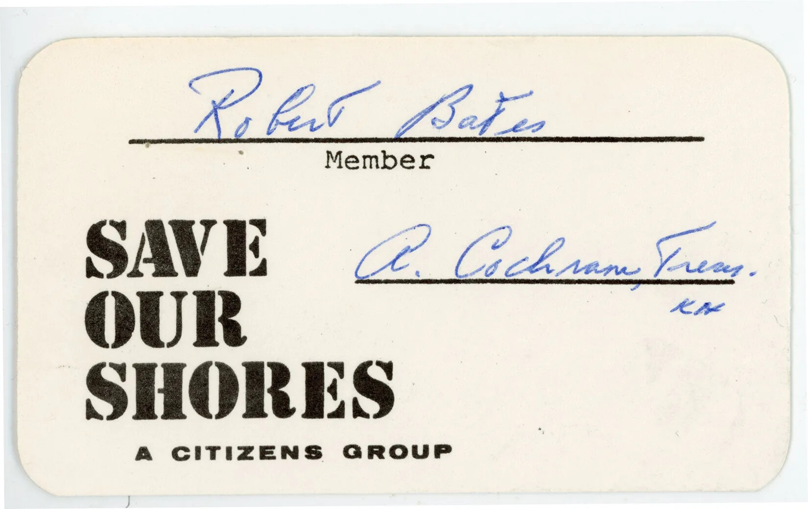 A business card with the title "SAVE/OUR/SHORES/A CITIZENS GROUP" in the lower left-hand corner. On the upper border of the card is a blank line with a signature written in blue ink. Beneath the line is the typed word "Member."