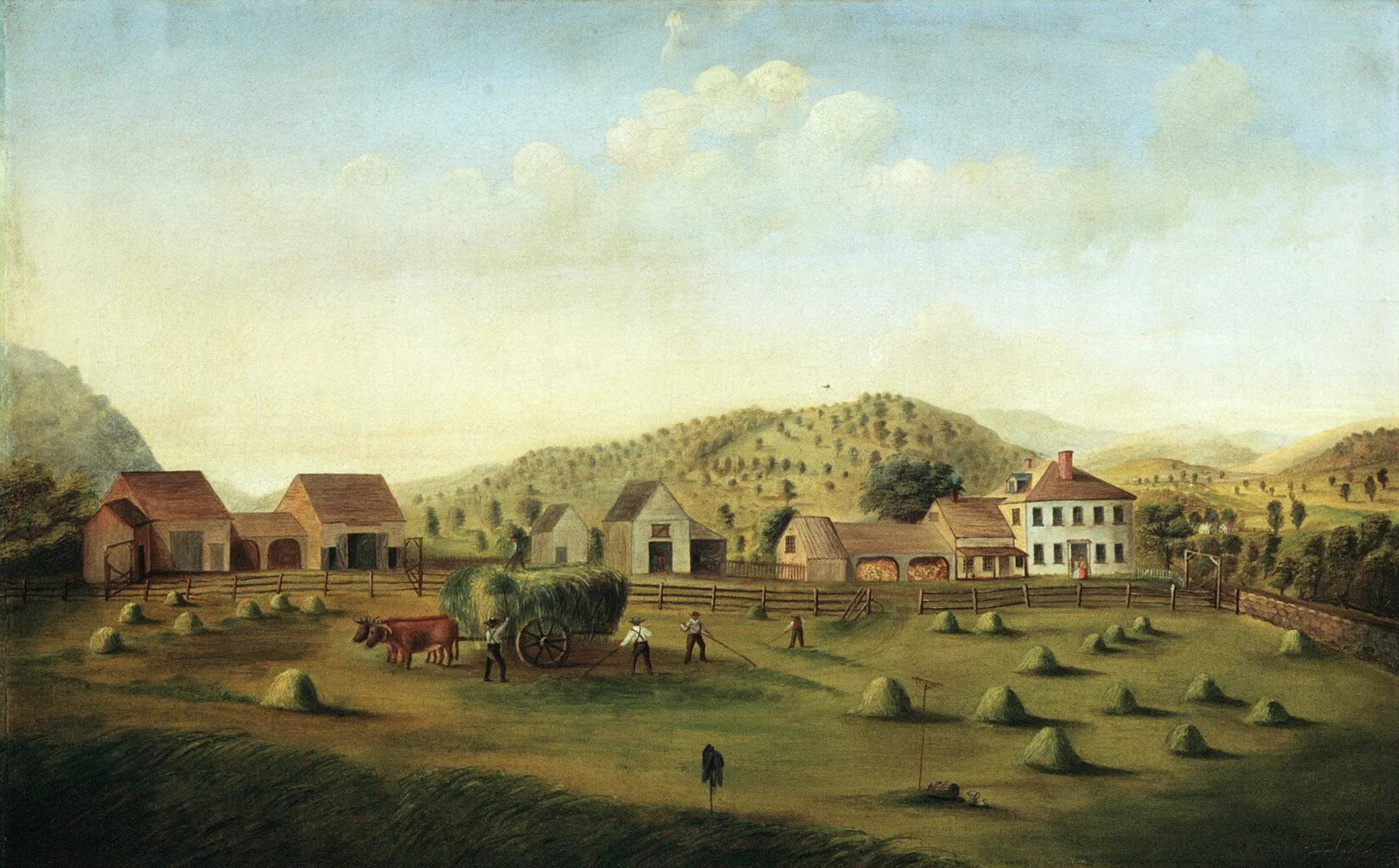 A colored painting of a two-story white house with several barns and out buildings in a large grassy field. Behind the buildings are large green hills covered with trees. In front of the buildings are several piles of green hay. Five men with rakes work in the field. A large pile of hay sits on top of a flat wagon, pulled by two brown oxen.
