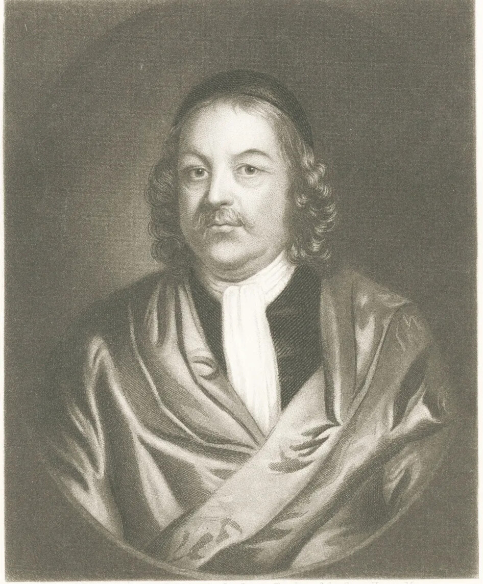 A black and white painting of a man with a mustache and long curly hair, facing the viewer. He wears a cap, a light-colored shirt with a ruffled collar, a black coat, and a shimmering cape draped over his shoulders.