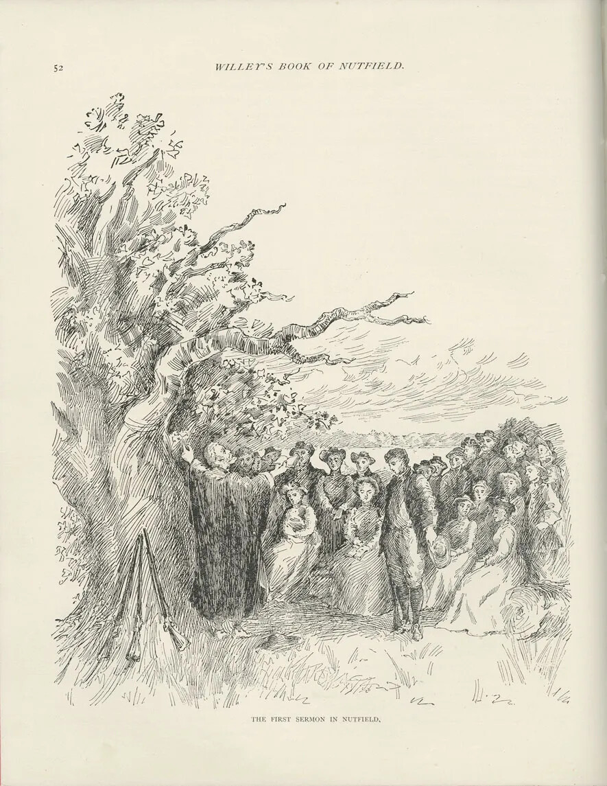 A black and white sketch shows an outdoor scene with a large tree with a thick trunk on the left. Under it a man stands with his arms outstretched to the sky. Facing him are a crowd of people, some sitting in front and some standing. The women wear long dresses and the men suits; most people wear hats. In the distance, there are clouds and many trees. 